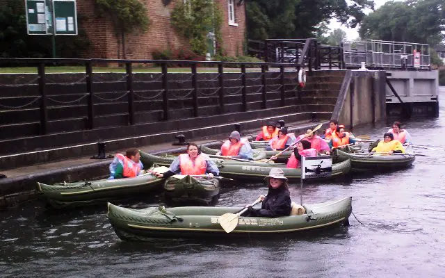 Group kayaking day out on the River Thames